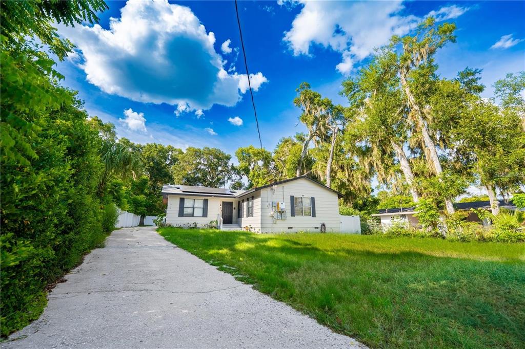 535 West Division Street Deland, FL 32720 - Photo 23 of 25 a view of house with garden