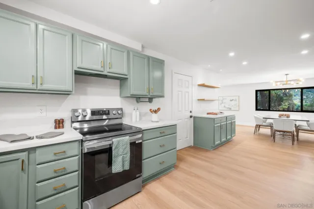 a bedroom with a large bed and a large window