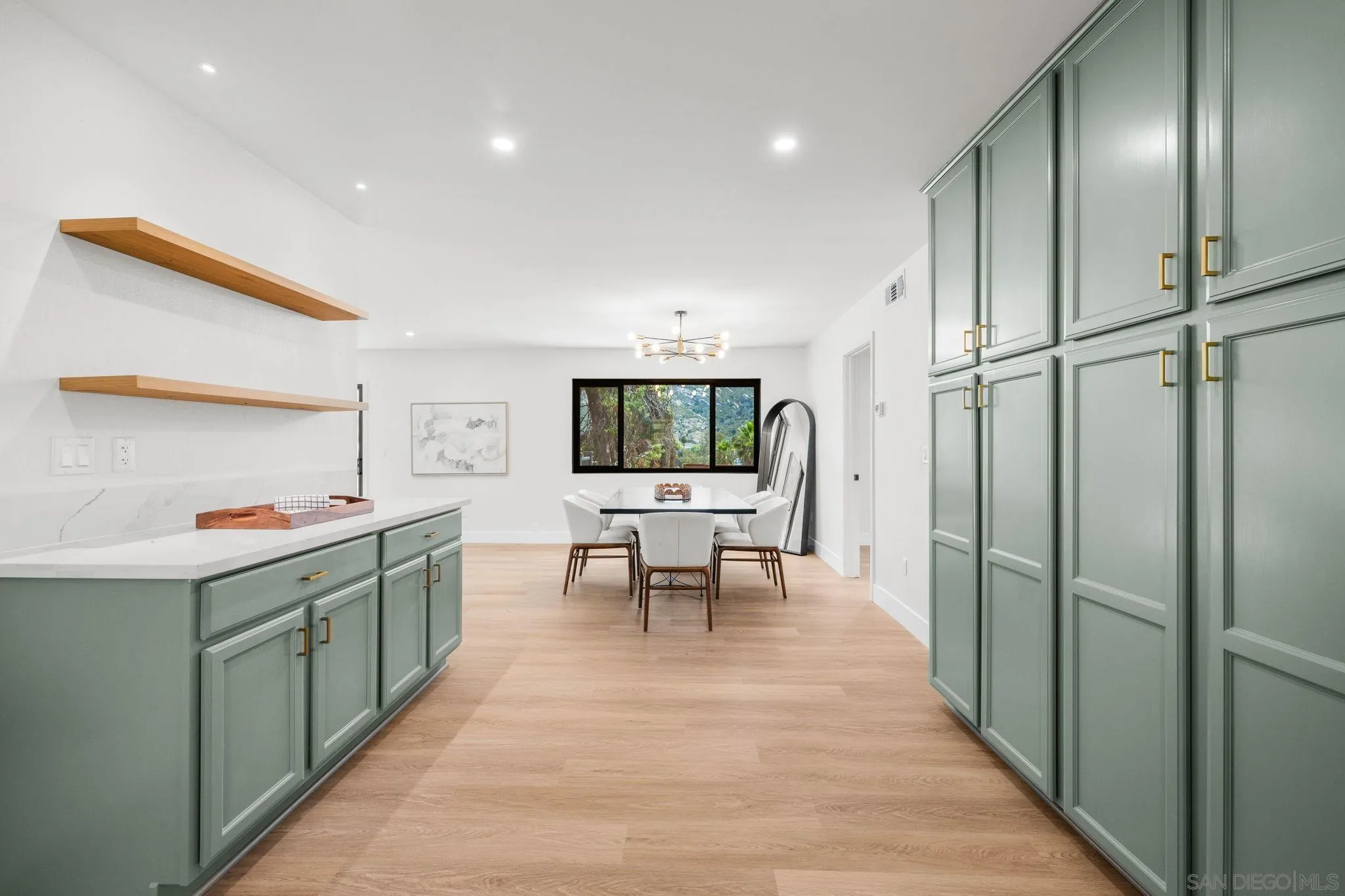 15277 Oak Creek Road El Cajon, CA 92021 - Photo 20 of 71 a kitchen with stainless steel appliances granite countertop a refrigerator and a sink