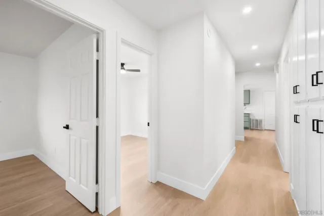 an aerial view of a house with a yard and garden