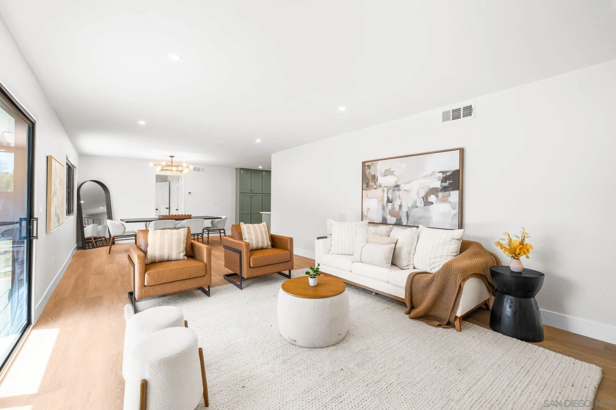 15277 Oak Creek Road El Cajon, CA 92021 - Photo 10 of 71 a living room with furniture and a potted plant