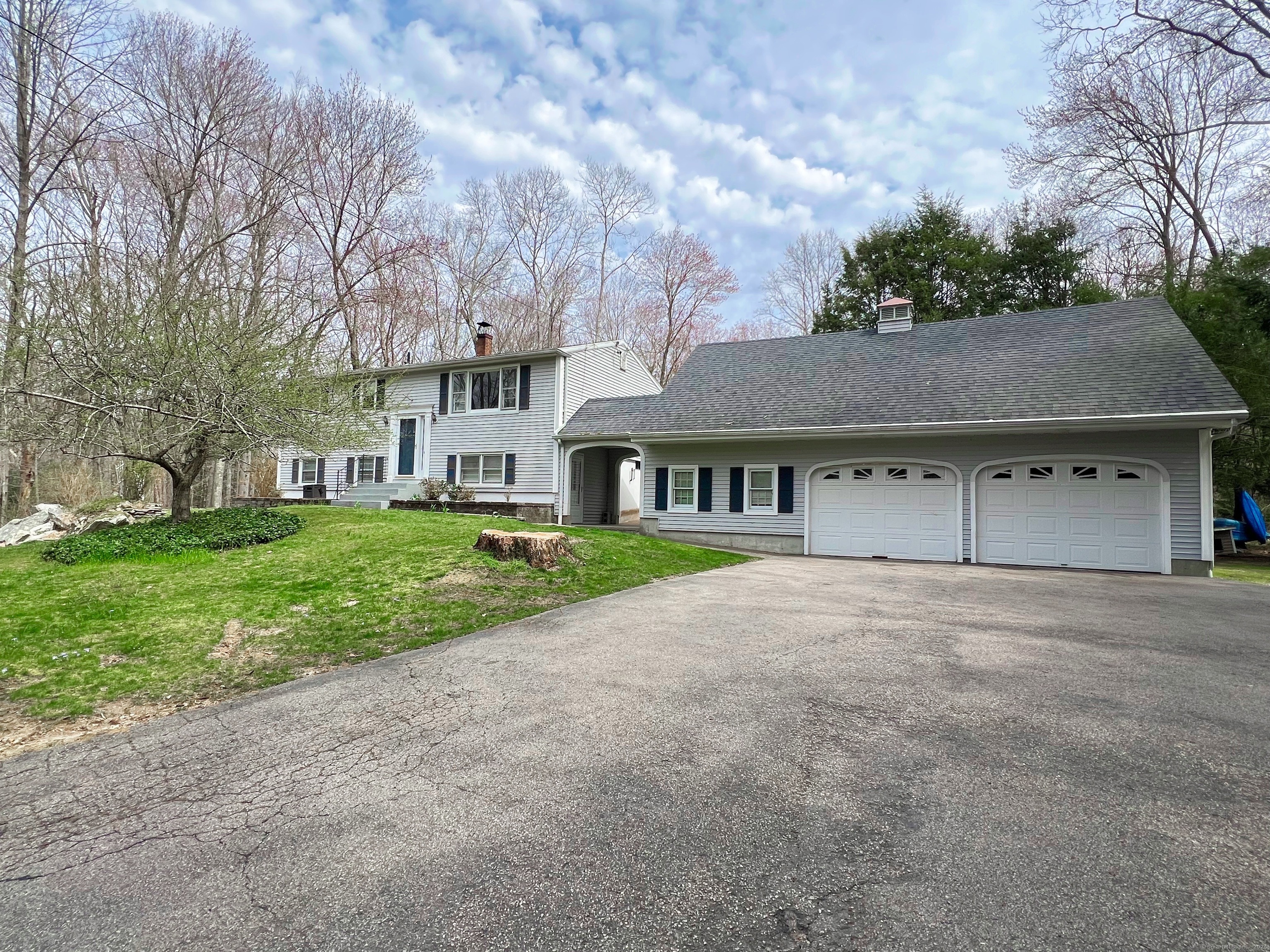 149 Spicer Hill Road Ledyard, CT 06339 - Photo 1 of 1 a front view of house with yard and green space