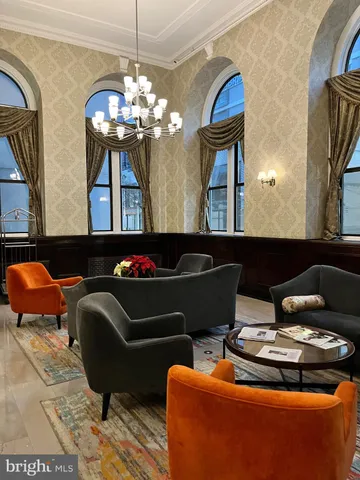 a room with furniture and wooden floor