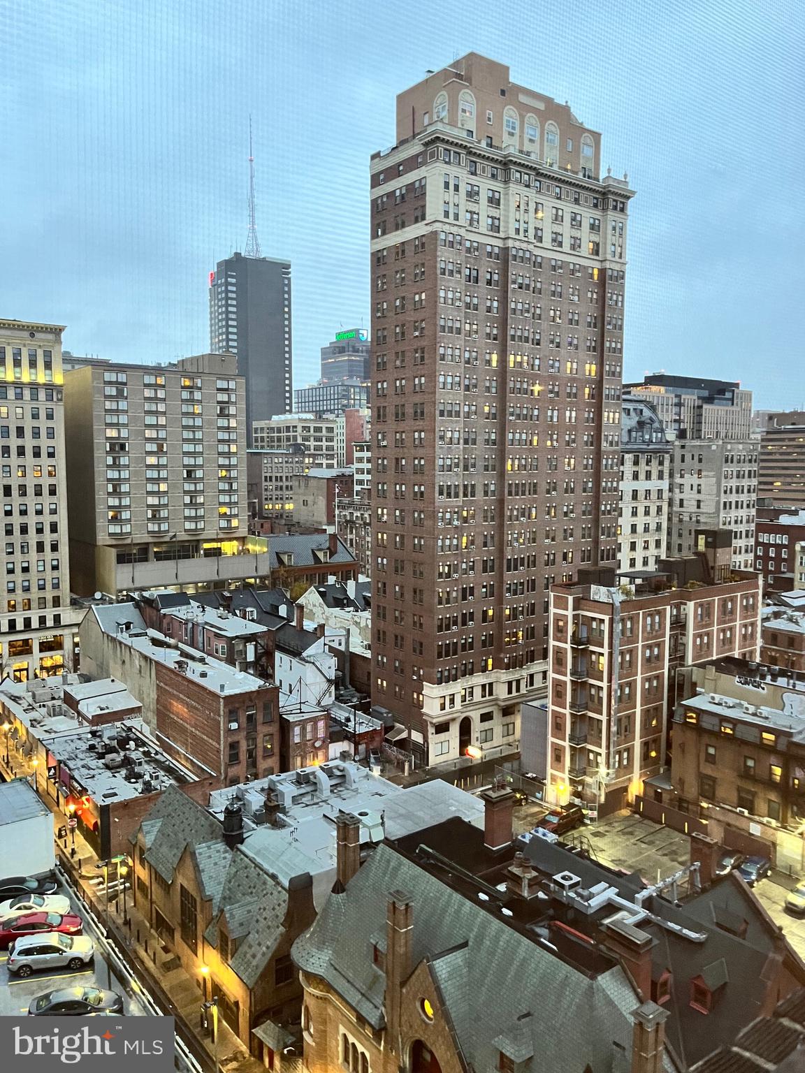 1324-32 Locust Street, Unit 1108 Philadelphia, PA 19107 - Photo 10 of 11 a view of a city with tall buildings