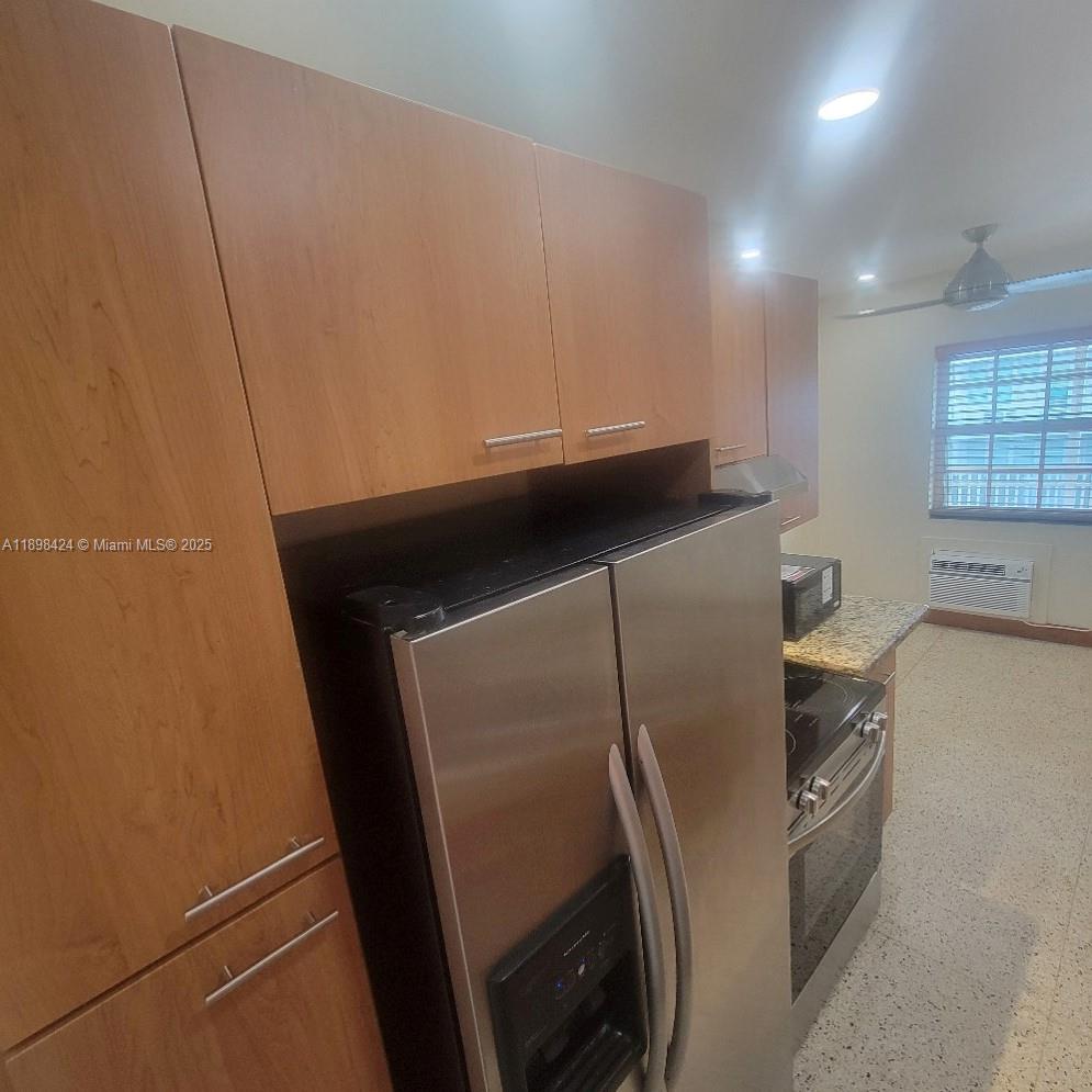 7400 Harding Avenue, Unit 15 Miami Beach, FL 33141 - Photo 6 of 24 a utility room with dryer and washer