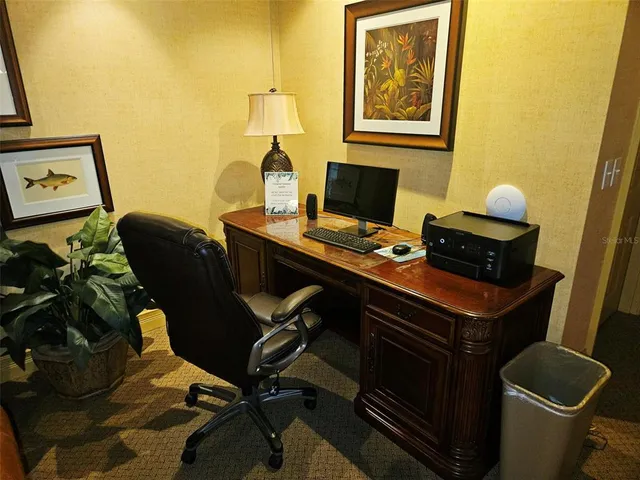 a room with furniture pool and flat screen tv