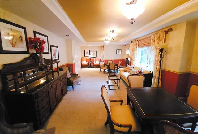 a large kitchen with cabinets and stainless steel appliances