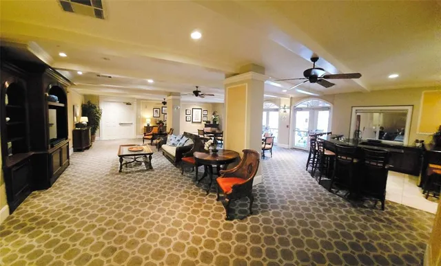 a living room with a couch and a flat screen tv