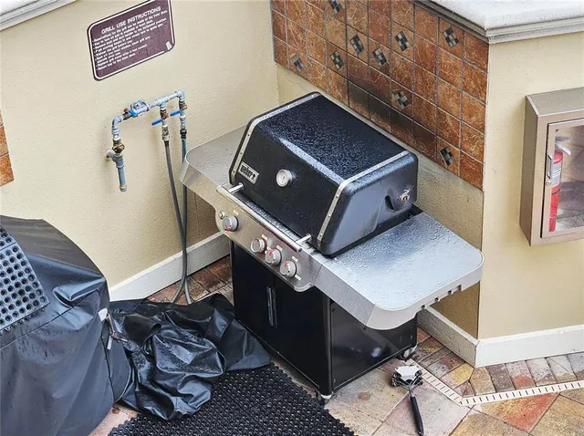 a view of parking garage with cars