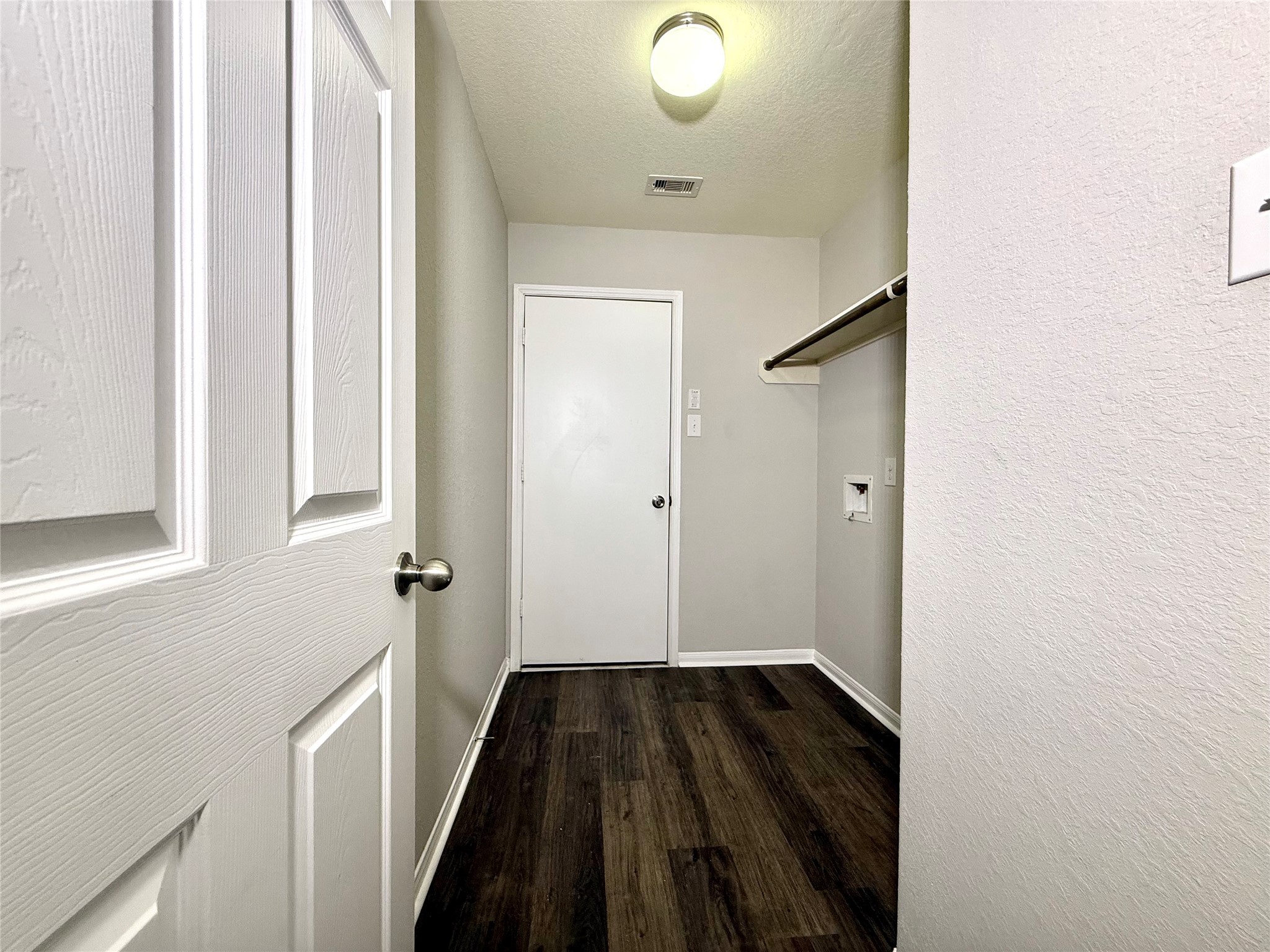 10646 Chestnut Path Way Tomball, TX 77375 - Photo 14 of 22 a view of a hallway with wooden floor and staircase