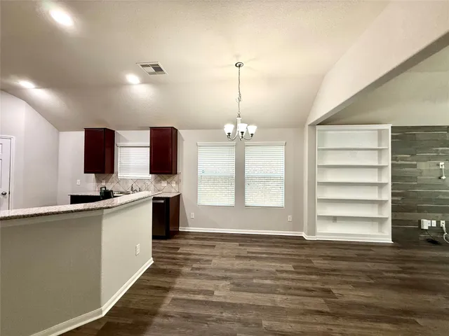 a view of a kitchen with a sink and dishwasher kitchen view