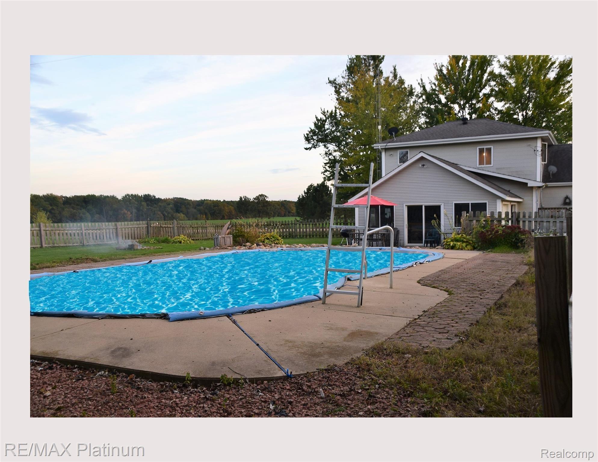 11209 Pittsburg Road Durand, MI 48429 - Photo 21 of 27 yard pool with water added.jpg
