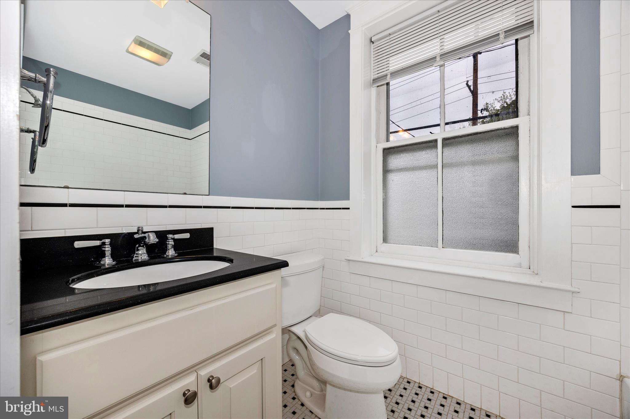 16 East 5th Street Frederick, MD 21701 - Photo 10 of 39 Hall Bath with charming black & white tile