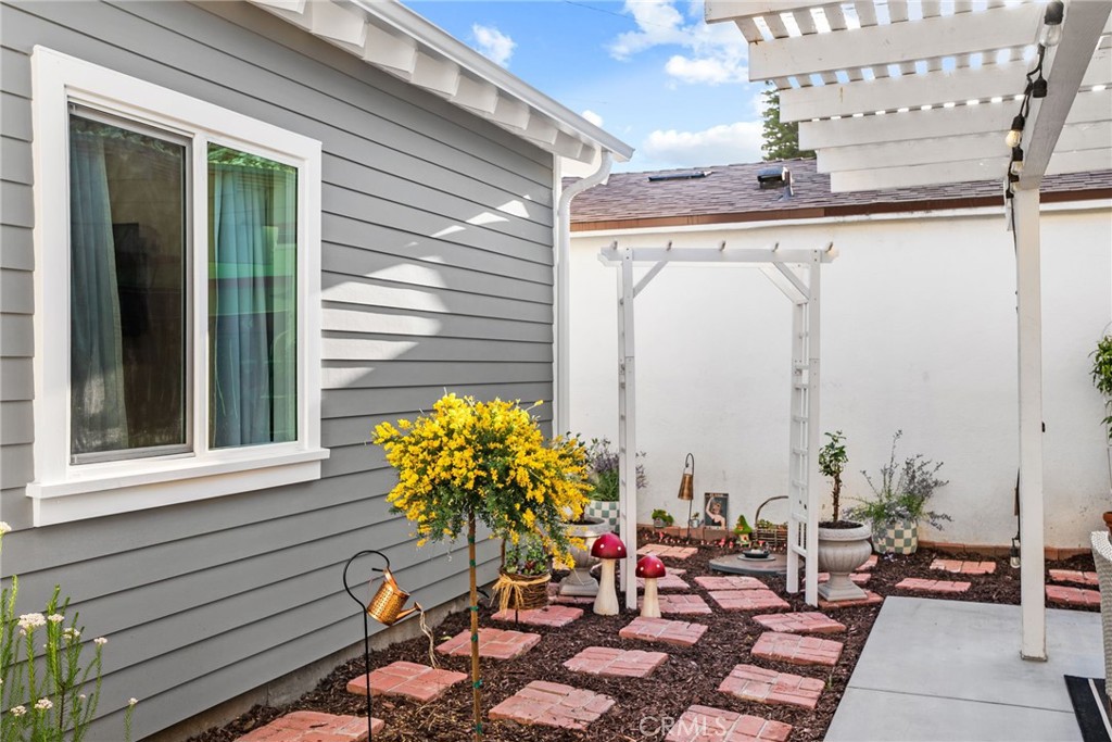 426 Jacaranda Place, Unit A Fullerton, CA 92832 - Photo 27 of 41 a potted plant sitting on a glass door