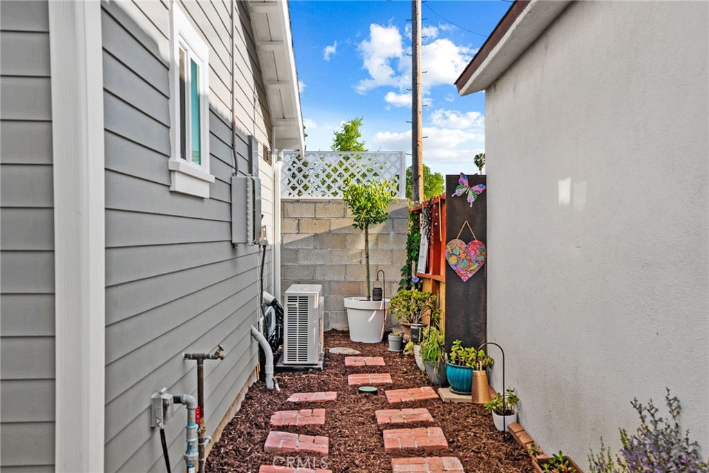 426 Jacaranda Place, Unit A Fullerton, CA 92832 - Photo 28 of 41 a view of path along with potted plant