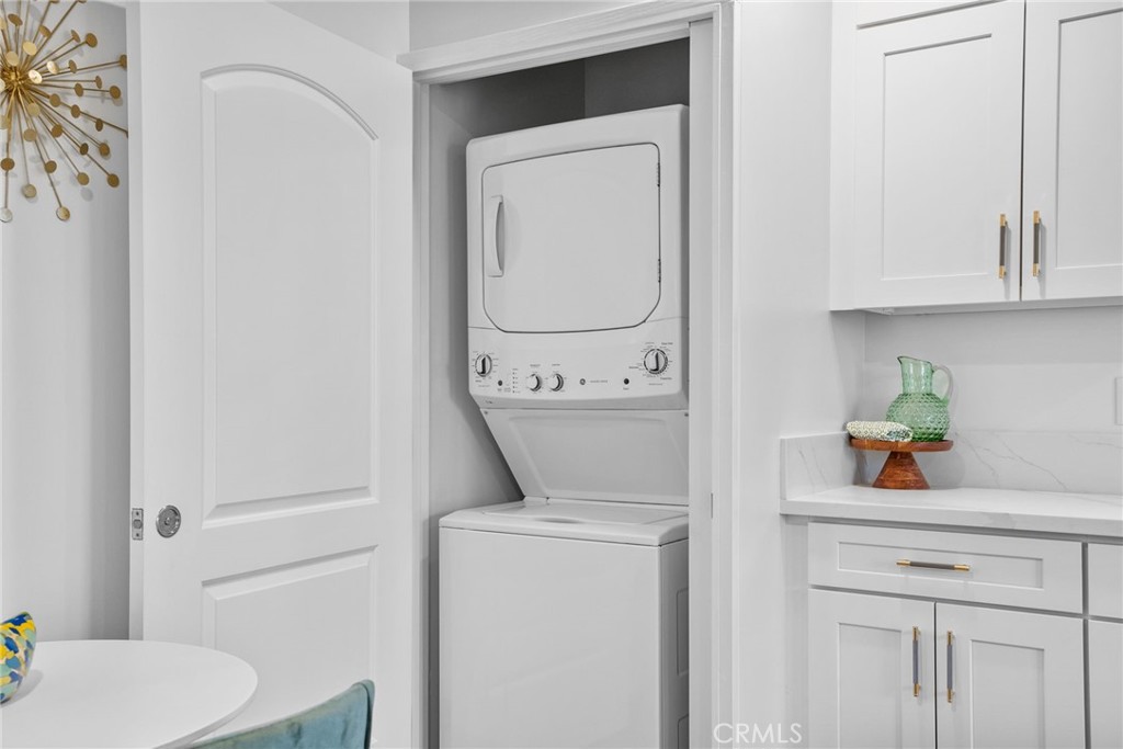 426 Jacaranda Place, Unit A Fullerton, CA 92832 - Photo 5 of 41 a utility room with dryer and washer