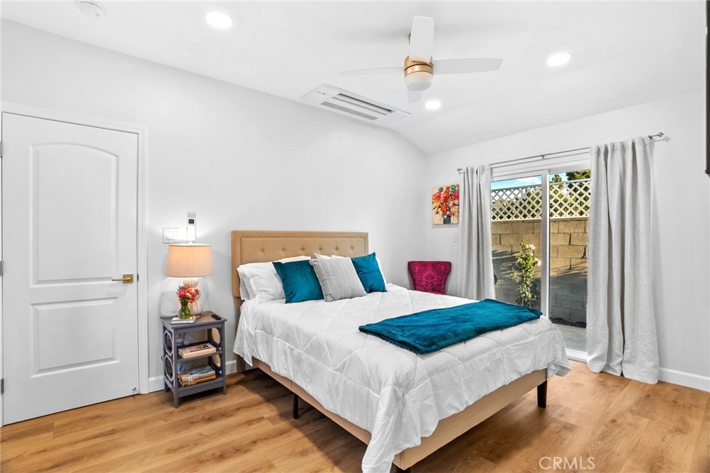 426 Jacaranda Place, Unit A Fullerton, CA 92832 - Photo 8 of 41 a bedroom with a bed and a window