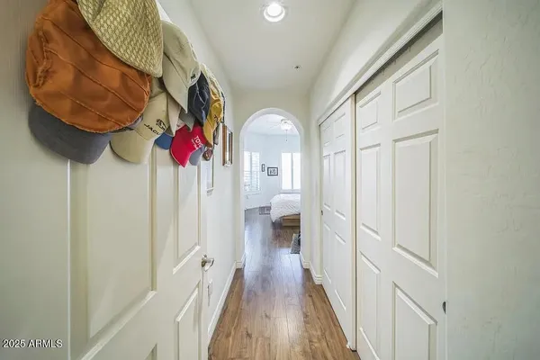a bathroom with a granite countertop sink a mirror and shower