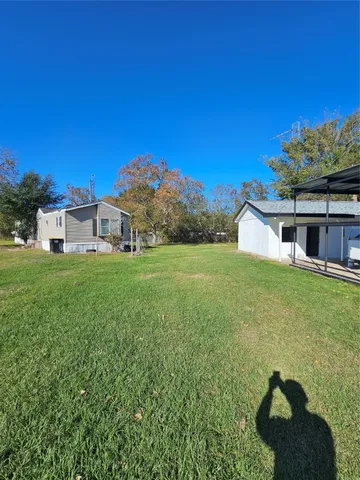 a house view with a garden space