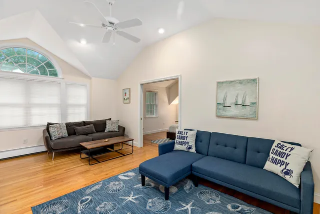 a living room with furniture and a couch