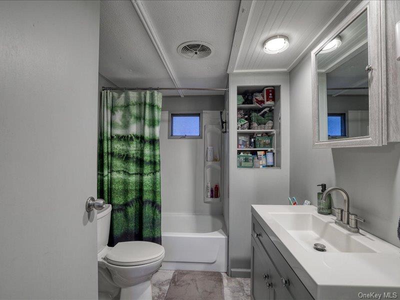 165 Lattintown Road, Unit LOT 60 Newburgh, NY 12550 - Photo 19 of 24 Bathroom with shower / tub combo and vanity