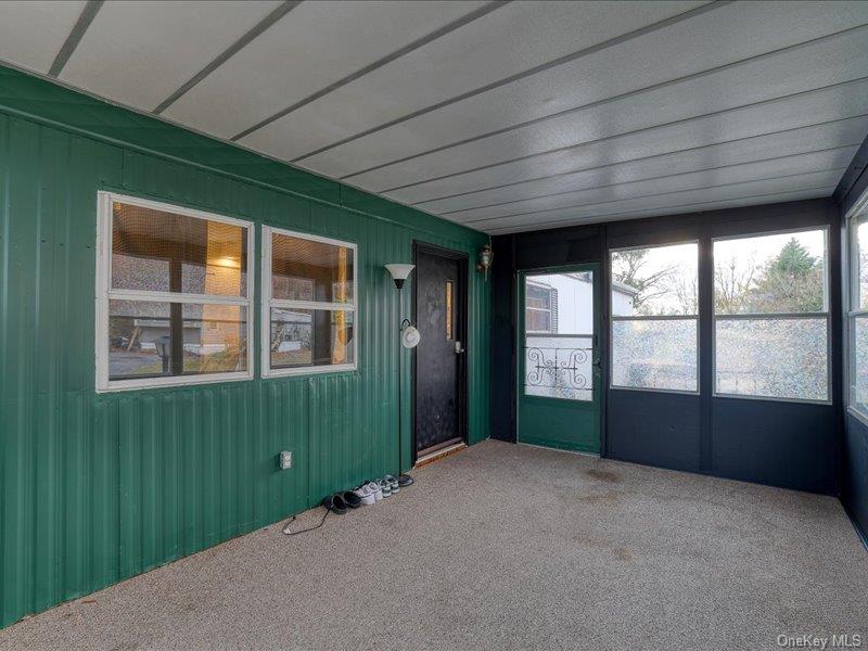 165 Lattintown Road, Unit LOT 60 Newburgh, NY 12550 - Photo 23 of 24 View of unfurnished sunroom
