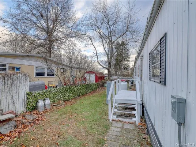 a view of a porch and garden