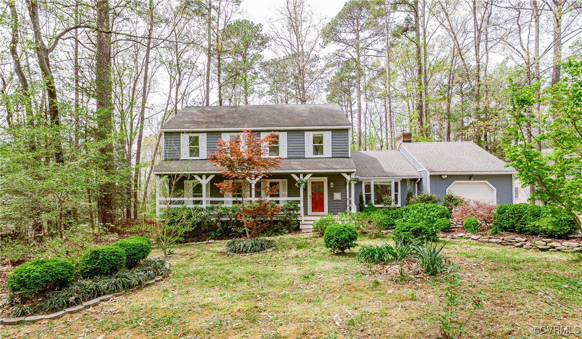 front view of a house with a yard