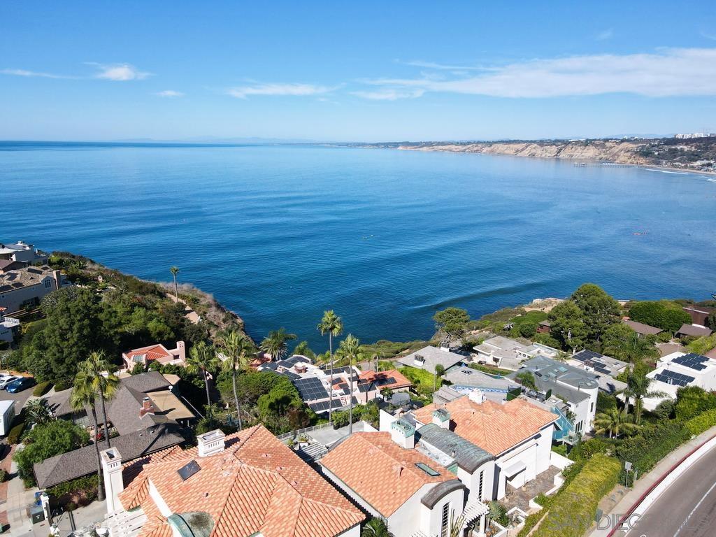 an aerial view of ocean with residential house and ocean view