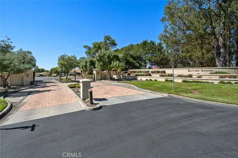a view of a swimming pool with an outdoor space and seating area