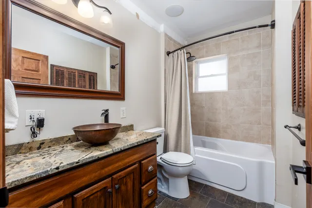 a view of front door with a mirror