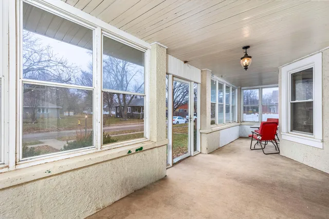 a view of a livingroom with furniture and window