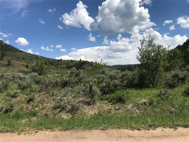 a view of a city and mountains
