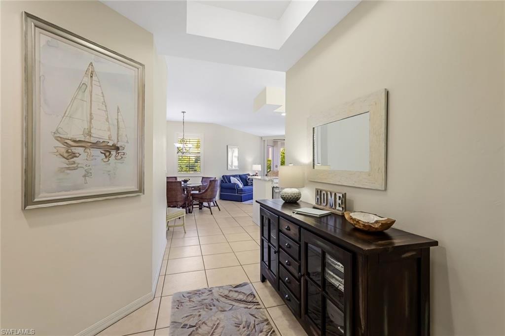 470 Launch Circle, Unit V301 Naples, FL 34108 - Photo 13 of 39 a view of a hallway with seating area