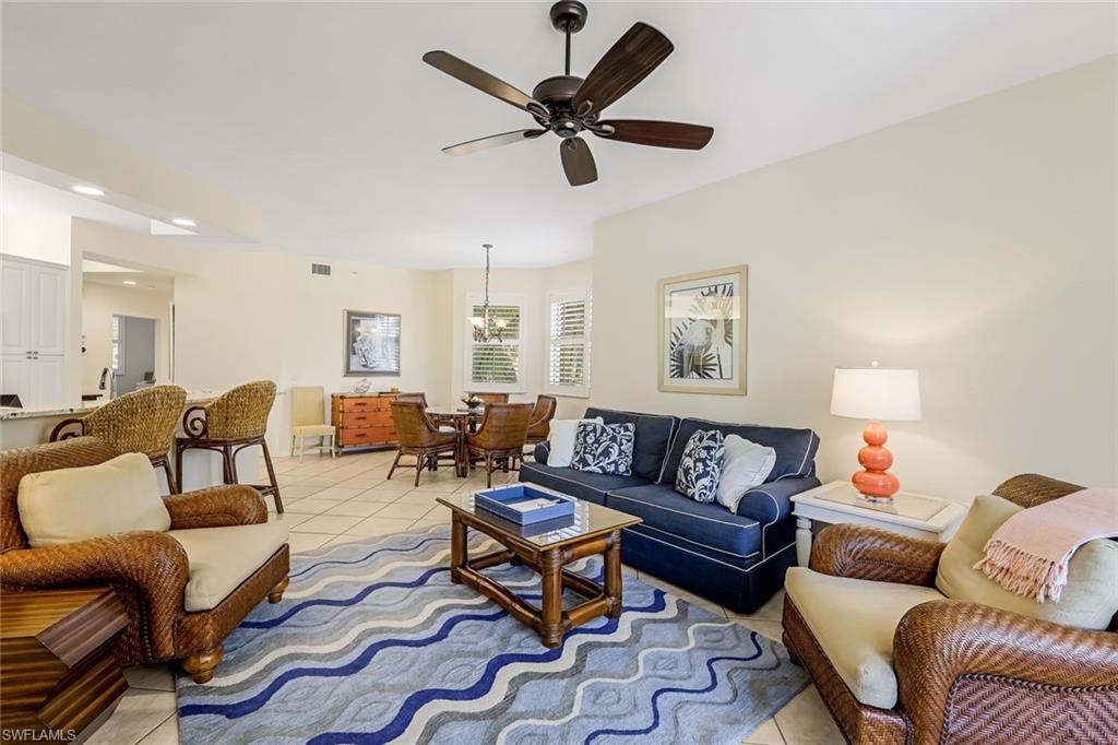 470 Launch Circle, Unit V301 Naples, FL 34108 - Photo 5 of 39 a living room with furniture