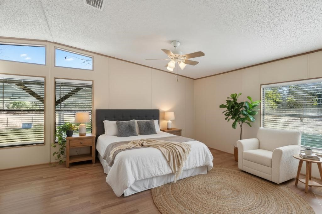 2744 Roy Sikes Road Hilliard, FL 32046 - Photo 53 of 97 a bedroom with a bed and a couch