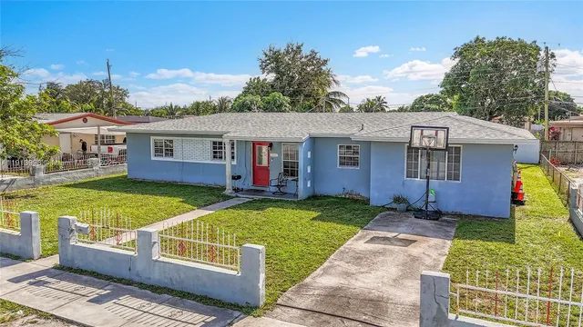 a view of a house with garden