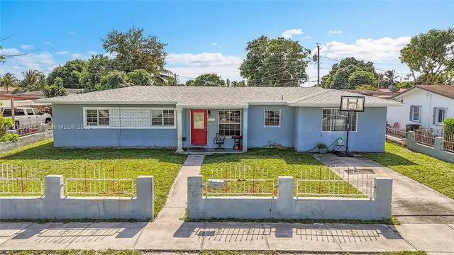 front view of a house with swimming pool