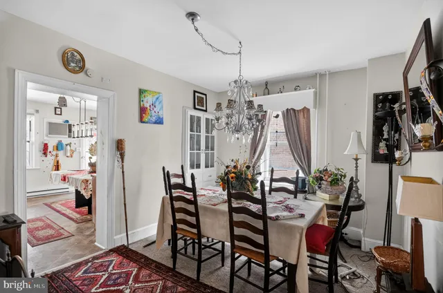 a kitchen filled with stainless steel appliances granite countertop a stove refrigerator and cabinets