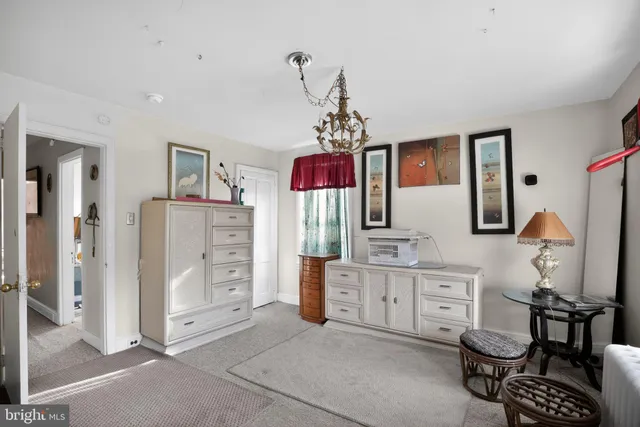 a room with a window and a lamp