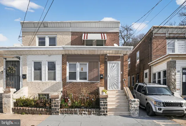 a view of a car park in front of a building