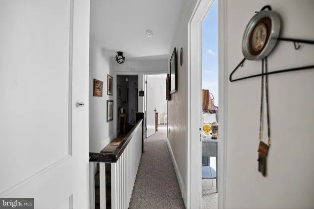 a view of a livingroom with furniture and toys