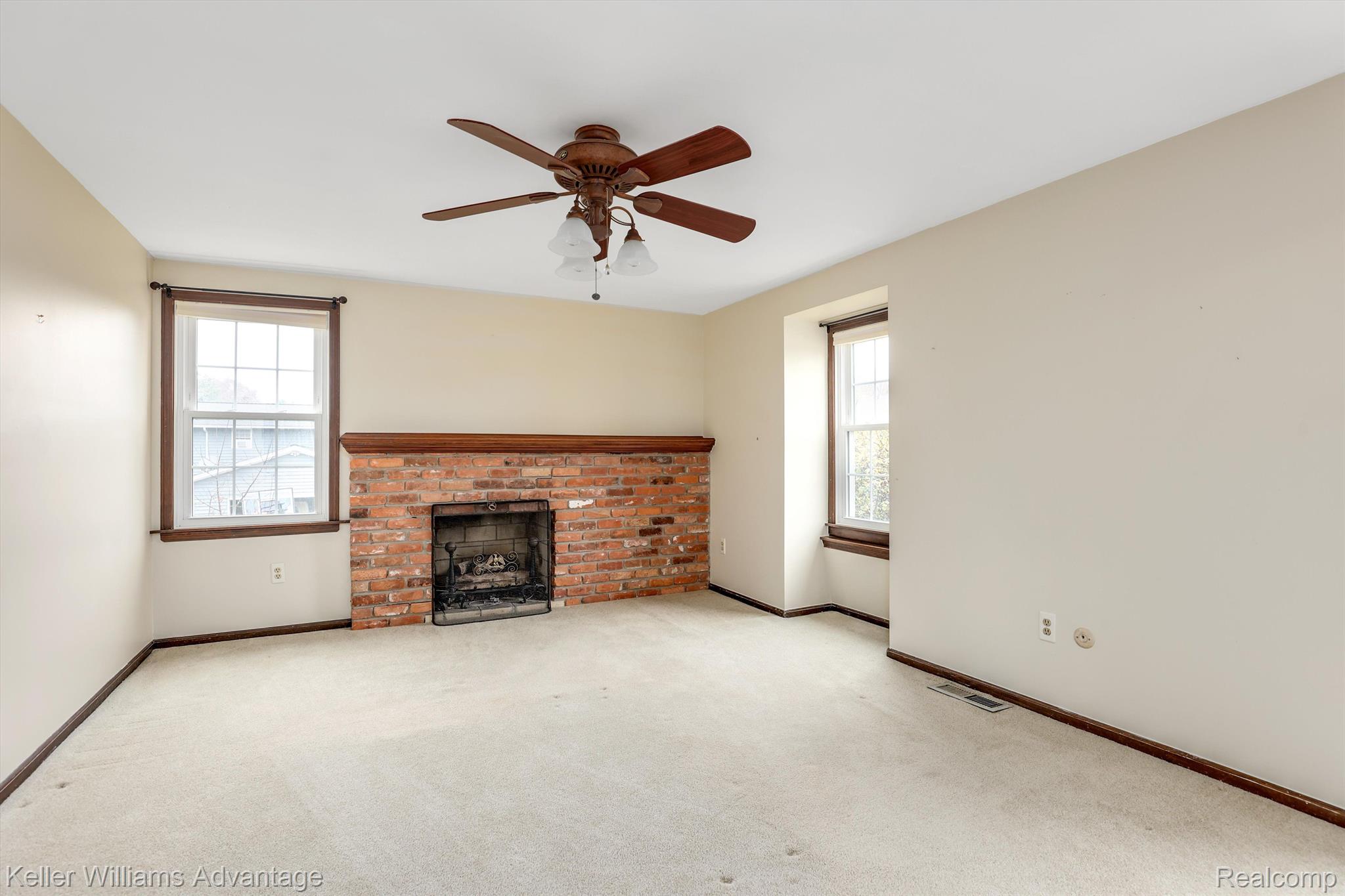 229 Aintree Road Rochester, MI 48306 - Photo 15 of 40 Primary bedroom - fireplace with brick hearth