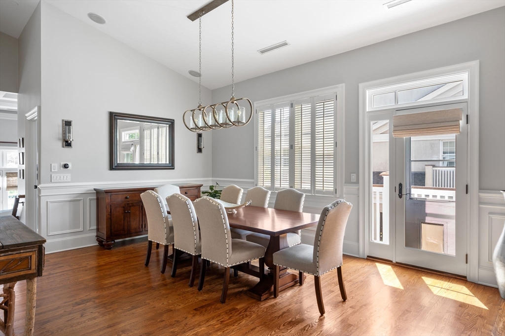 221 Victory Road, Unit 221 Quincy, MA 02171 - Photo 13 of 34 a view of a dining room with furniture window and wooden floor