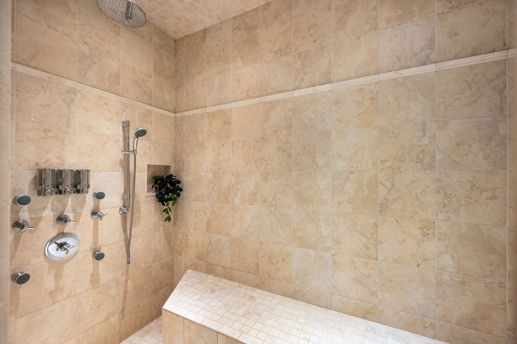 221 Victory Road, Unit 221 Quincy, MA 02171 - Photo 21 of 34 a bathroom with a shower