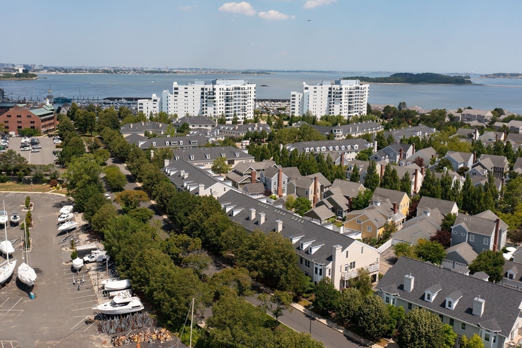 221 Victory Road, Unit 221 Quincy, MA 02171 - Photo 29 of 34 a view of a city and lake