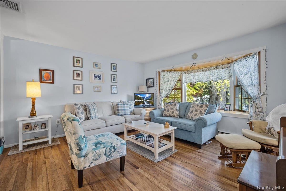 10 Richard Road Mahopac, NY 10541 - Photo 2 of 33 Living room featuring hardwood / wood-style floors and baseboards