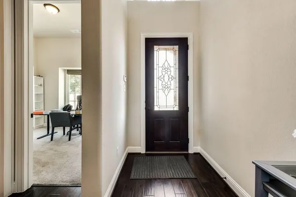 a view of a livingroom from a hallway