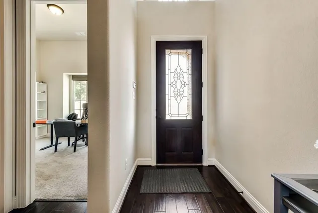 a view of a livingroom from a hallway