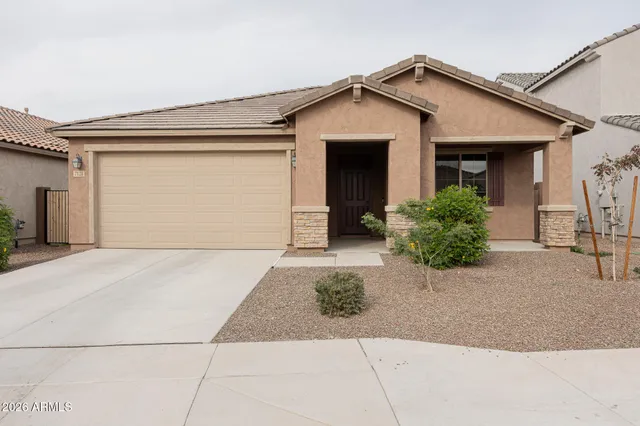 a front view of house with garage